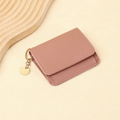👜A retro-style wallet, palm-sized, that can hold multiple cards and features a hidden pocket.