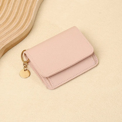 👜A retro-style wallet, palm-sized, that can hold multiple cards and features a hidden pocket.