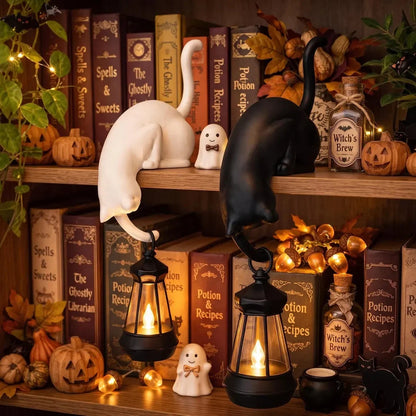 🐈‍This adorable cat figurine with LED lights can be placed on a bookshelf—it serves as both a cute bookshelf decoration and a practical keychain.