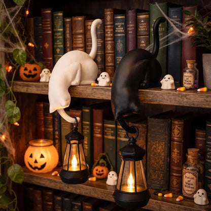 🐈‍This adorable cat figurine with LED lights can be placed on a bookshelf—it serves as both a cute bookshelf decoration and a practical keychain.