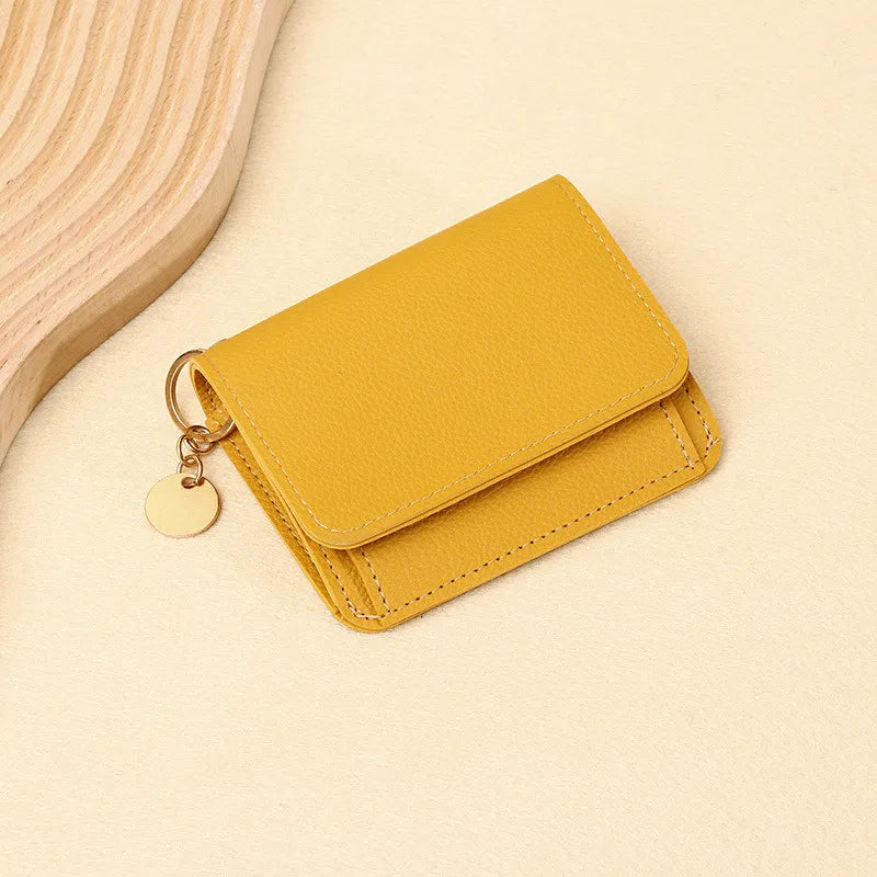 👜A retro-style wallet, palm-sized, that can hold multiple cards and features a hidden pocket.