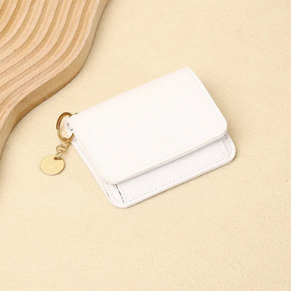 👜A retro-style wallet, palm-sized, that can hold multiple cards and features a hidden pocket.