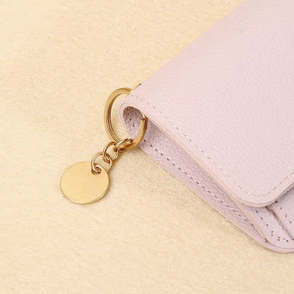 👜A retro-style wallet, palm-sized, that can hold multiple cards and features a hidden pocket.