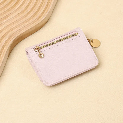 👜A retro-style wallet, palm-sized, that can hold multiple cards and features a hidden pocket.