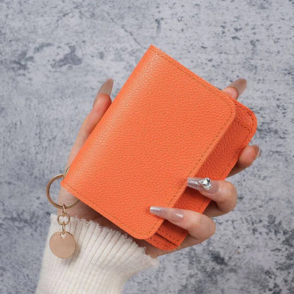 👜A retro-style wallet, palm-sized, that can hold multiple cards and features a hidden pocket.